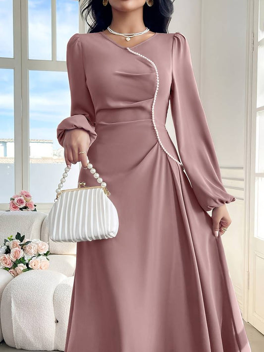 Mauve wrap dress with pearl accessories