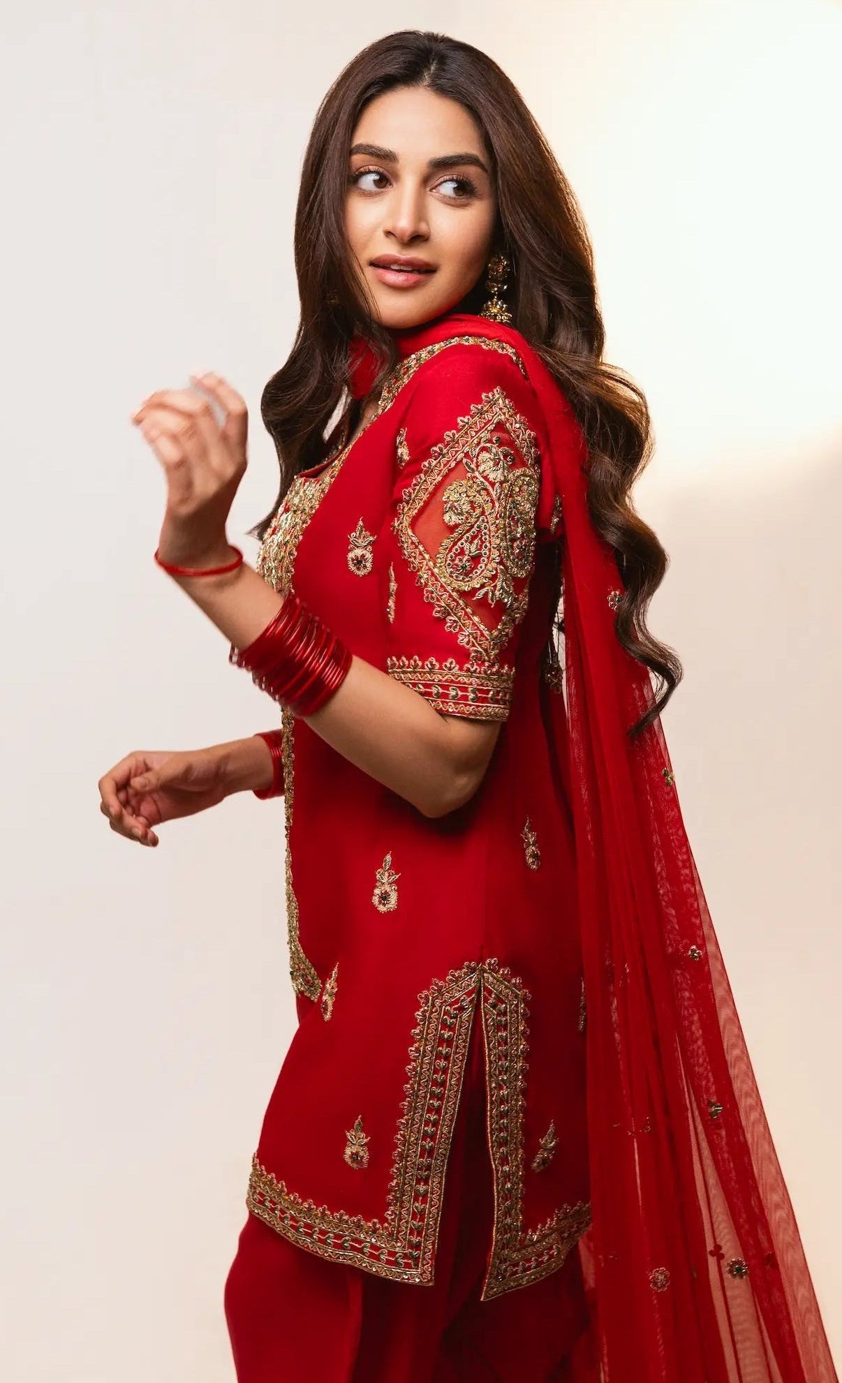 Anmol Baloch in a Pakistani red traditional dress with gold embroidery in a new 2026 dresses collection